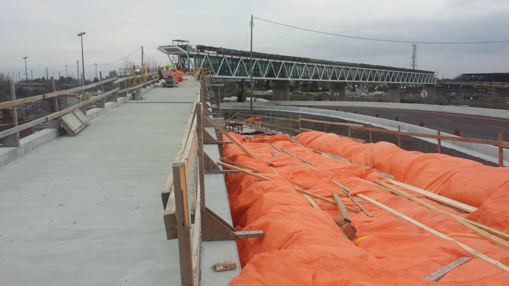 Construction of stairs and-ramp-advance at south and north sides of Coventry Pedestrian Footbridge