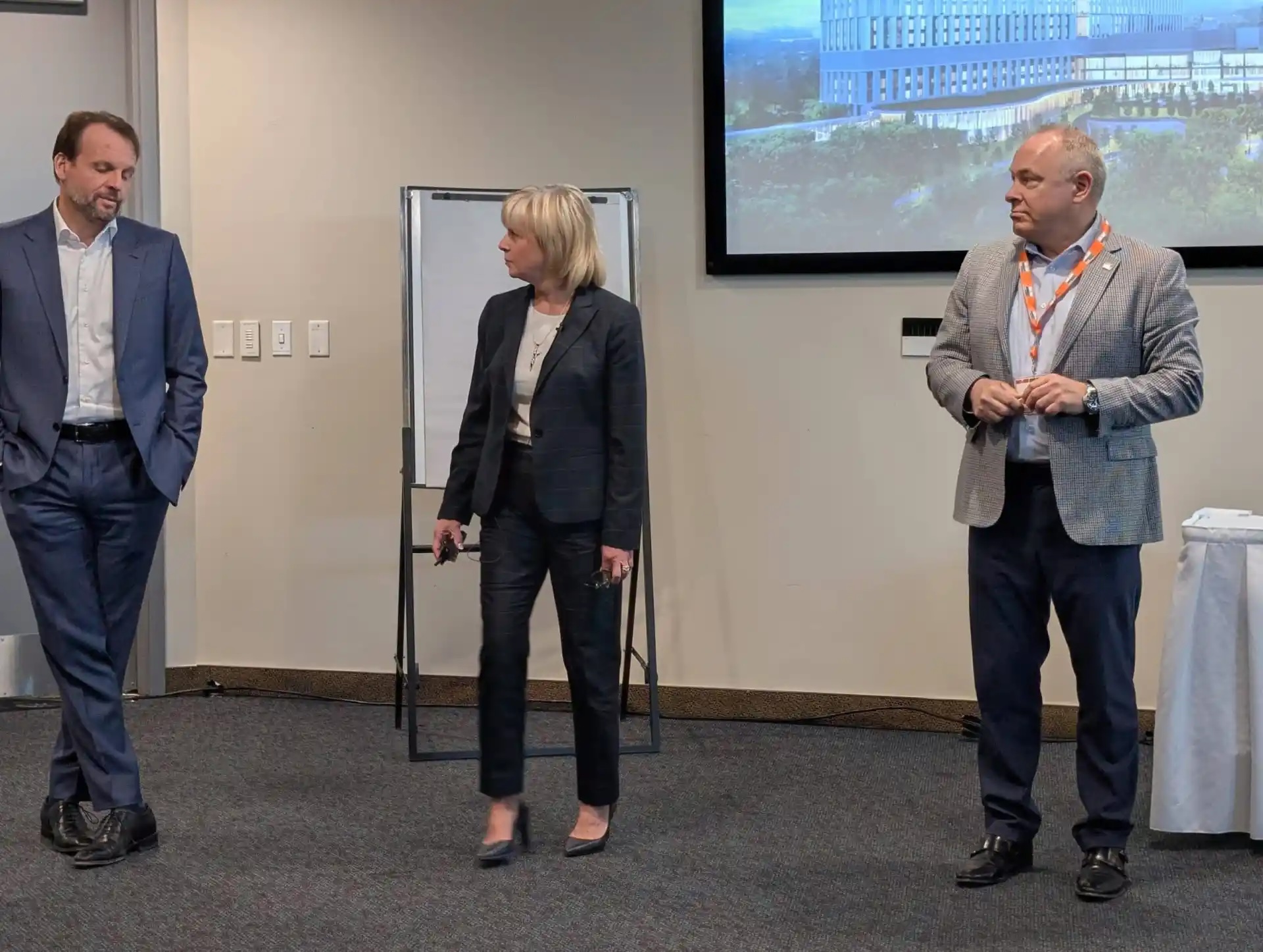 Tony Cook, a project director at PCL Construction (left) with Joanne Read, executive vice-president and chief Planning and Development Officer for The Ottawa Hospital and Tim J. Kluke, president and CEO, The Ottawa Hospital Foundation