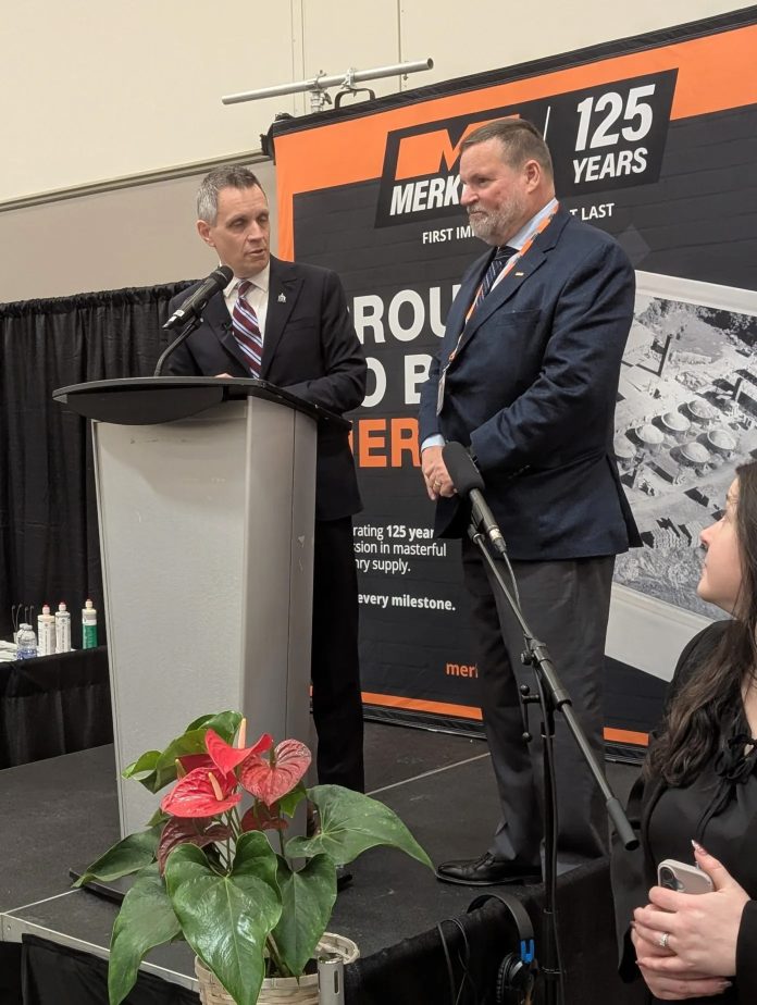 Ottawa mayor Mark Sutcliffe (left) with Robert Merkley