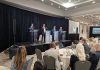 Mayoral candidates clash over development fees, boundary expansion and approval delays at industry debate